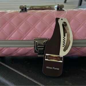 Wine purse. Brand new. Never used. Includes cork screw.